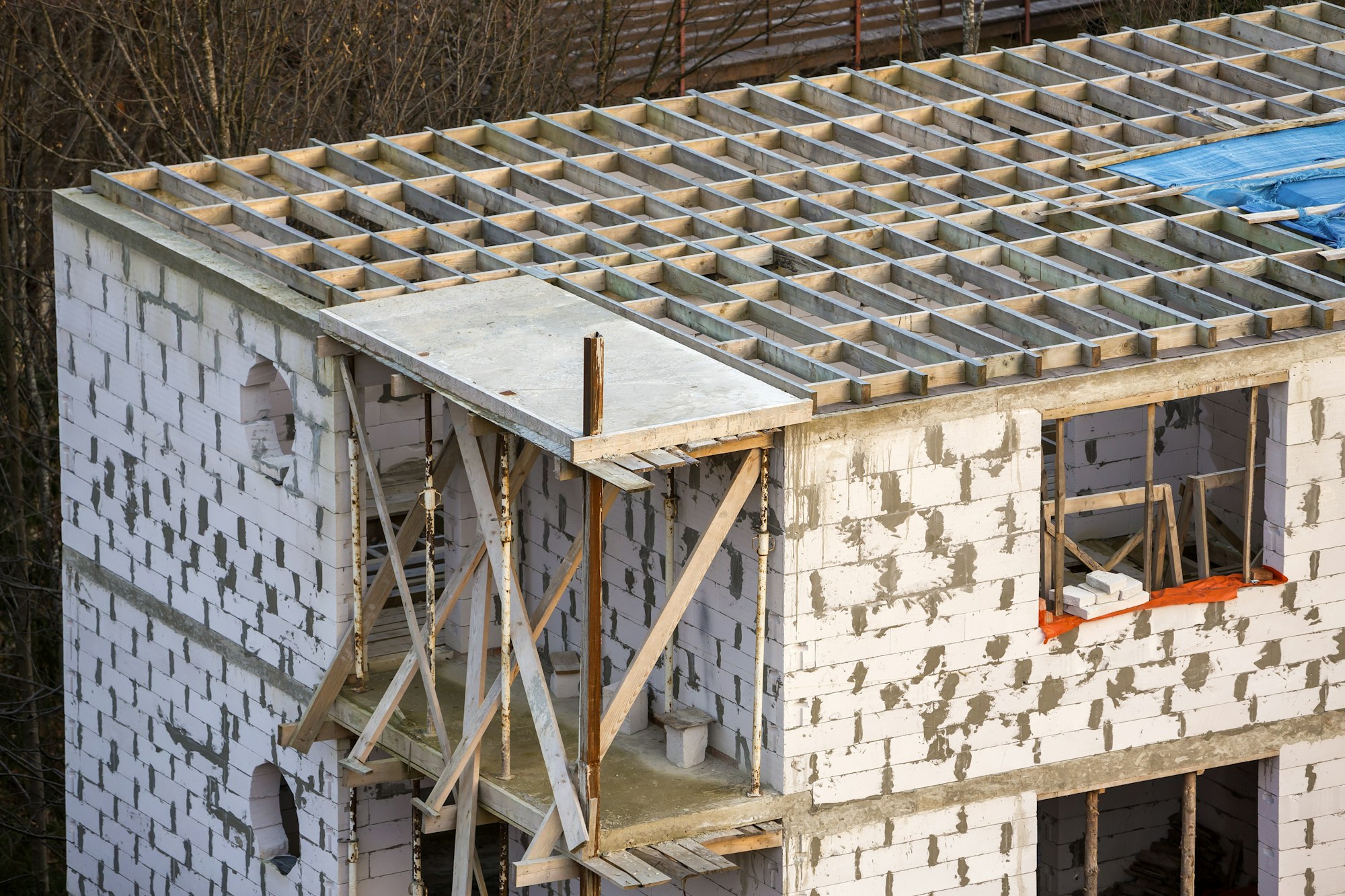 Building under construction. Roof beams frame and roofing underlayment, water-resistant waterproof