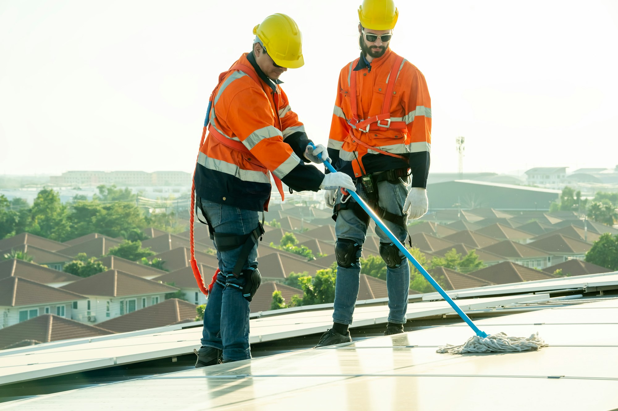 Engineer working setup Solar panel at the roof top. Engineer or worker work on solar panels or solar